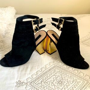 Peep toe black bootie with gold heel